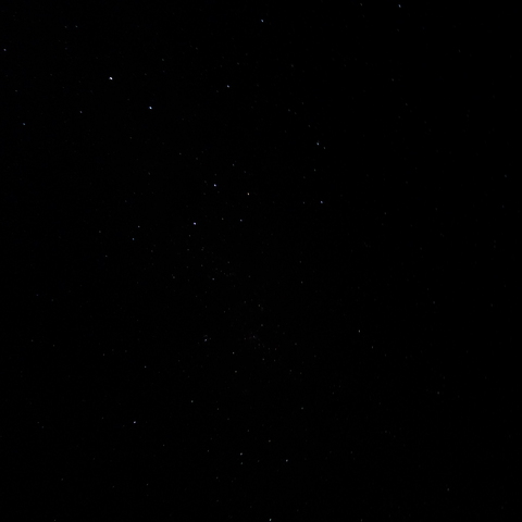 Sparkling stars surrounded by darkness