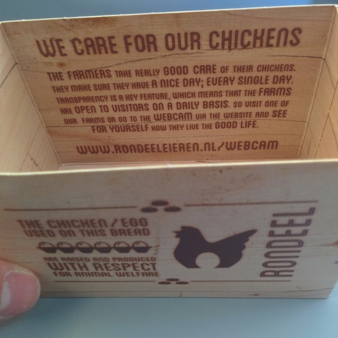 KLM sandwich box on flight from TXL to AMS with note 'The chicken /
egg used on this bread are raised and produced with respect for animal
welfare.'