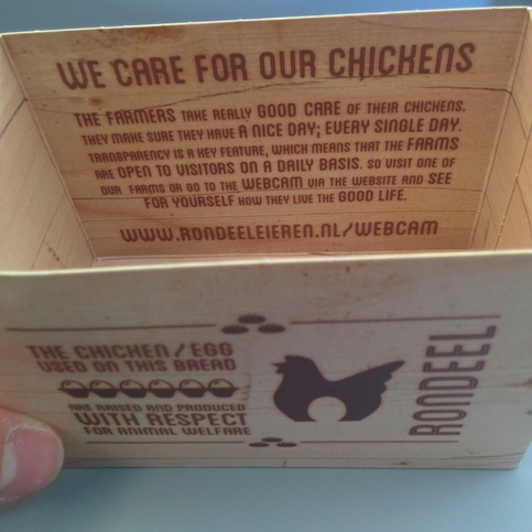 KLM sandwich box on flight from TXL to AMS with note 'The chicken /
egg used on this bread are raised and produced with respect for animal
welfare.'