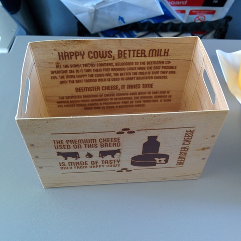 KLM sandwich box on flight from CWL to AMS with note 'The premium
cheese used on this bread is made of tasty milk from happy cows.'